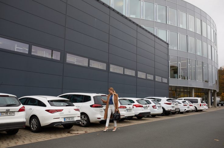 woman using corporate carsharing