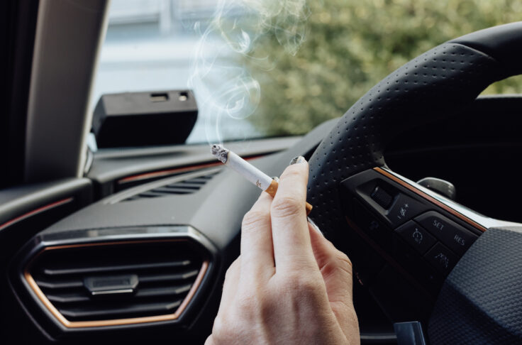 Lit cigarette in car sharing car