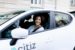 smiling woman driving a citiz car