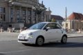 a share now car driving in the city