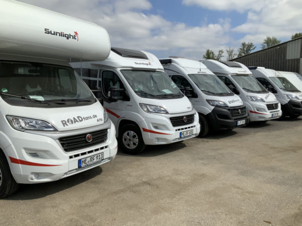 Roadfans vehicles with campervan telematics at a sharing station