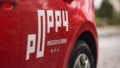 closeup of poppy carsharing car