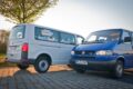 A van from CarlundCarla.de next to the blue original van.